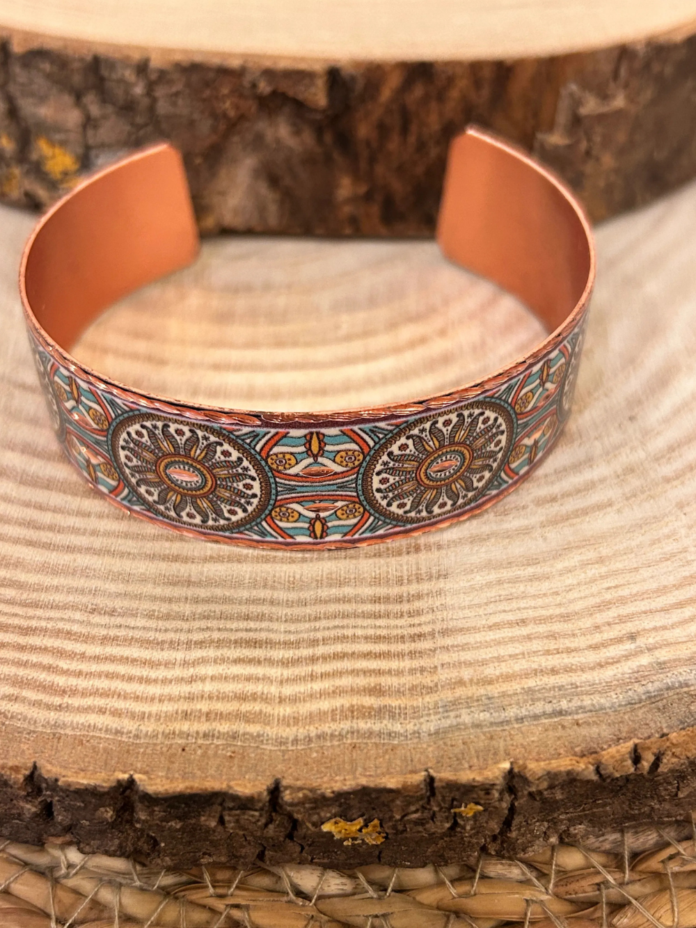 Copper Cuff with Flower of Life Pattern on Earth-Toned Background